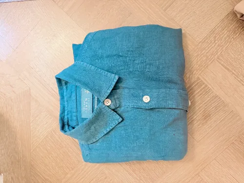 The original blue shirt saved in Lavo