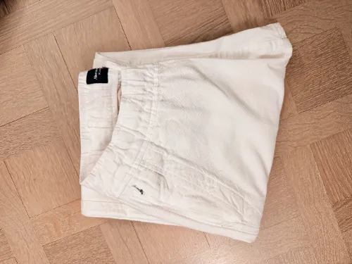 The original white trousers saved in Lavo